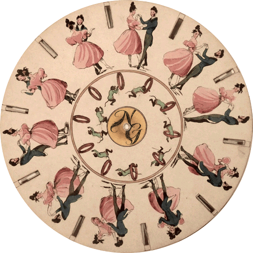 An animated vintage wheel of dancing couples with a worn black NG stamp at its punched center.